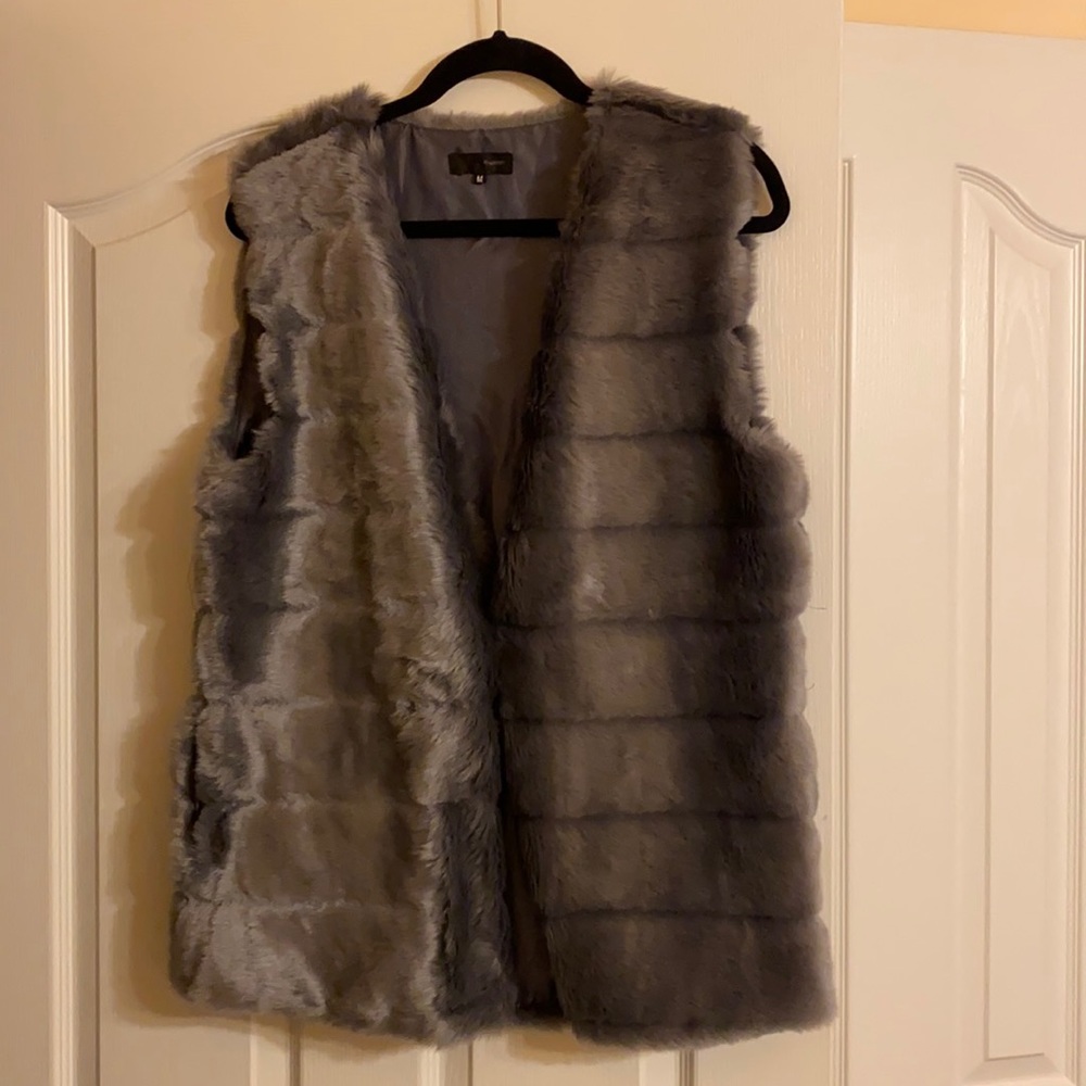 Shiny silvery grey fur vest